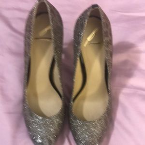 Brand new Brian Atwood silver glitter shoes.